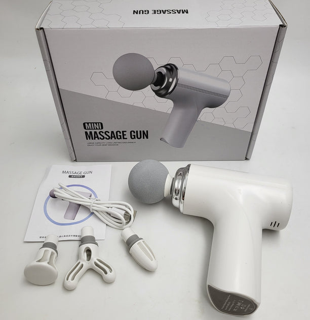 Mini Massage Gun white with retail box, four massage heads, USB cable and manual